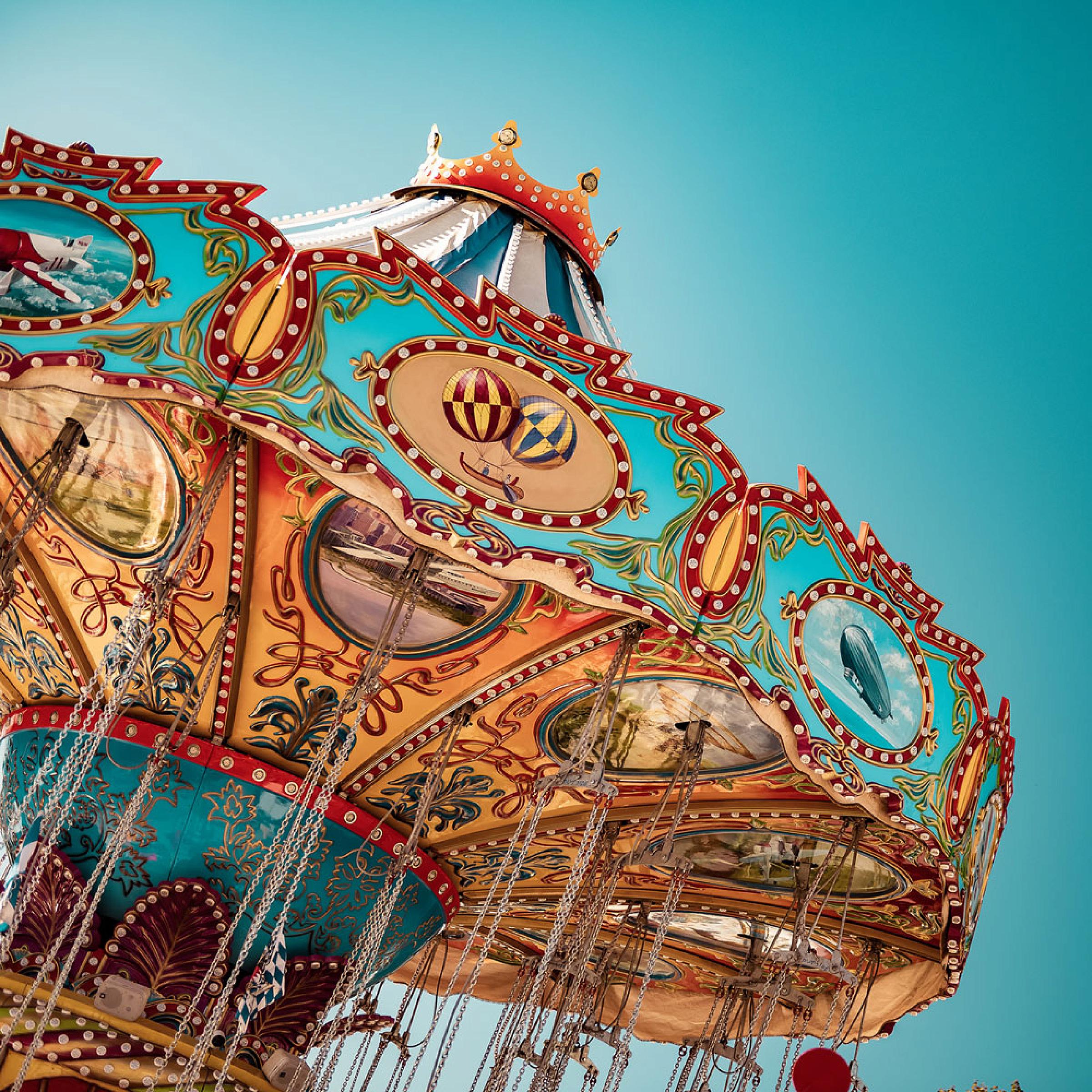 Angled shot of a swing ride at an amusement park